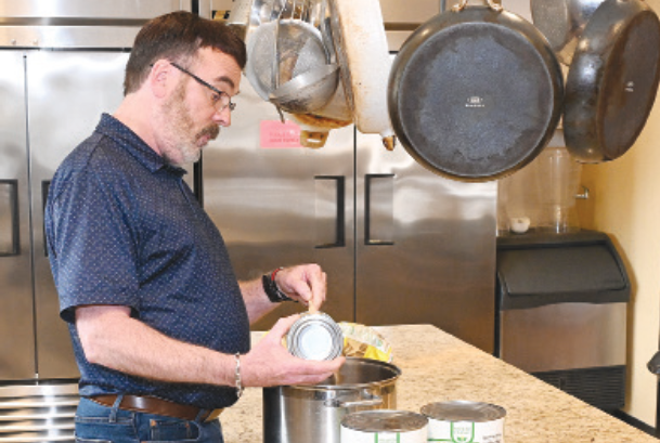 James Breeden prepares for the 16th annual Christmas Feast at Matthews Memorial Presbyterian Church, set for Dec. 25. The free holiday meal will be available for carry-out or delivery.