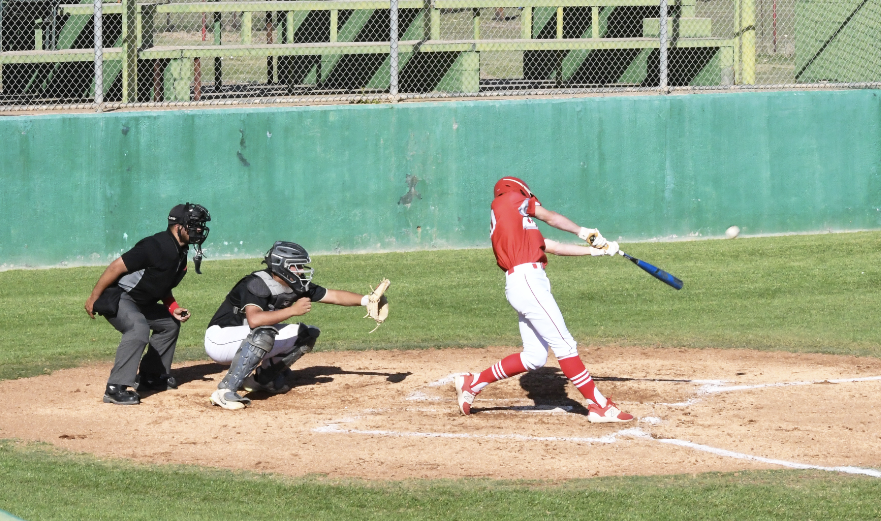 Albany splits district games with tough loss, strong win