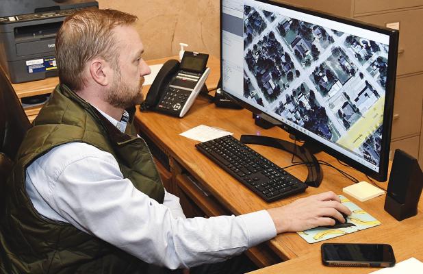 Appraiser Adam Ray looks over properties during the first few days of his new duties at the Shackelford County Appraisal District office. Ray has been an Albany resident since 2020. Donnie Lucas / Albany News