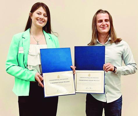 Albany seniors Madailein Beard (l) and Landon Kreitler (r) were officially honored as Gold Star Award recipients during the District 7 4-H banquet Monday night in San Angelo. Courtesy Photo