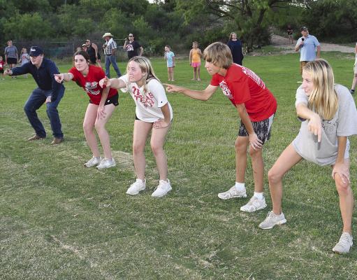 High school cast members practice the train sequence during a Tuesday night Fandangle rehearsal on the newly sodded portion of the Prairie Theater stage. Tickets have started selling quickly for the summer shows, with the Saturday performances, as usual, going the fastest. The rehearsal schedule can be found on the Fandangle website. Donnie Lucas / Albany News