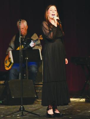Carley Price performs Eric Clapton’s “Let It Rain, part of an annual concert at the Aztec Theater that showcases local talent, including a six-piece band. Proceeds benefit the theater. Melinda Lucas / Albany News
