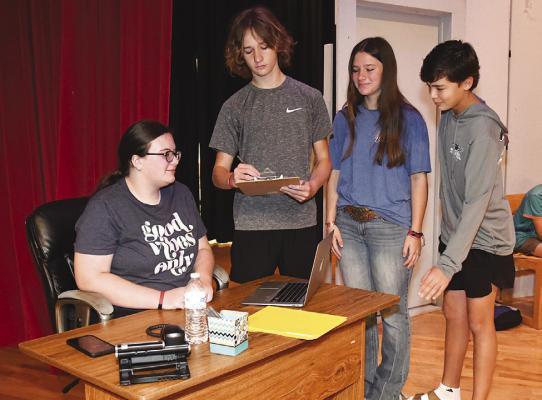 Eighth graders (l-r) Zadee Dun, Rush Kidd, Kamryn Graham, and Aiden Vickers work through a scene in “Happily Ever After.” A public performance is planned on Nov. 14. Donn ie Lucas / Albany News