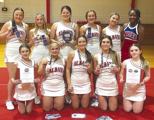 Albany’s varsity cheerleaders who spent three days immersing themselves in jumps, spirit, voice projection, chants, and crowd involvement included (front, l-r) Tara Cauble, Lainey Cash, Madi Parrott, Mimi Ivy, Maddie Stapp, (back) Carsyn Clegg, Myleigh Leveridge, Madailein Beard, Tatum Grady, and Finlee Brown, as well as NCA instructor Ja’Mya Cole. Named as All-American Cheerleaders were Cash, Ivy, and Parrott. Courtesy Photo