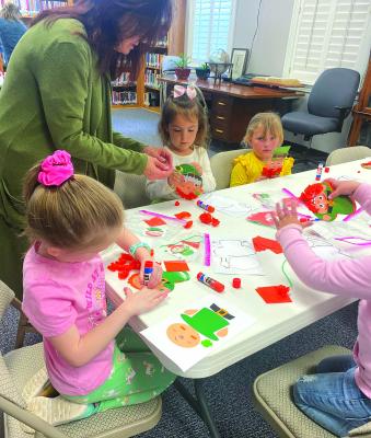 Mothers Day Out visits library